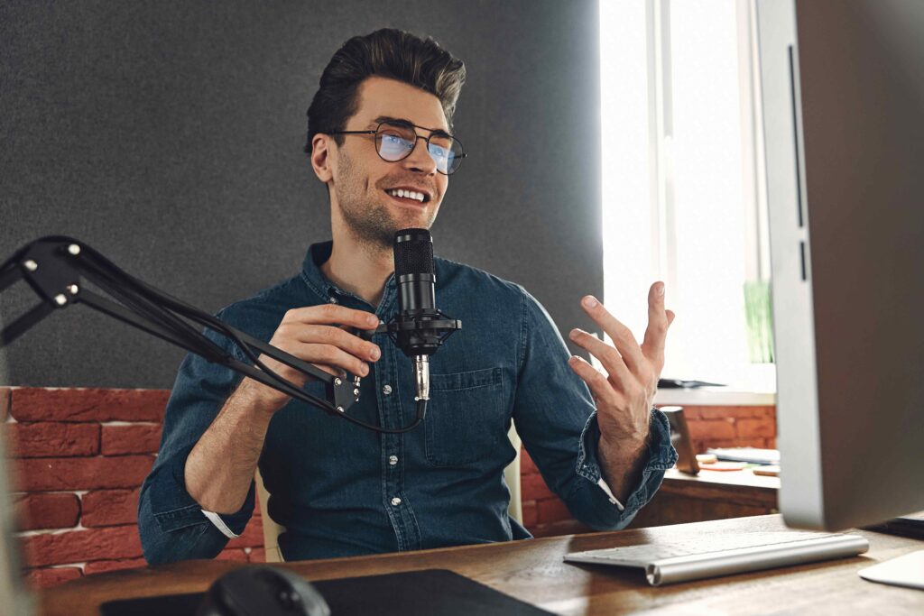 Young man speaking into microphone